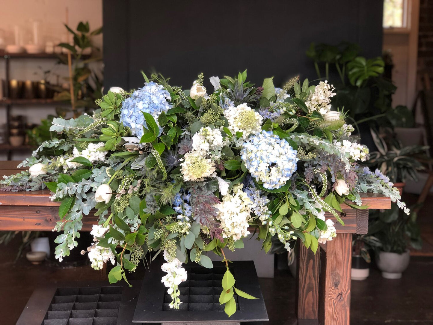 blue skies casket spray funeral from flower + furbish Shop now at flower + furbish