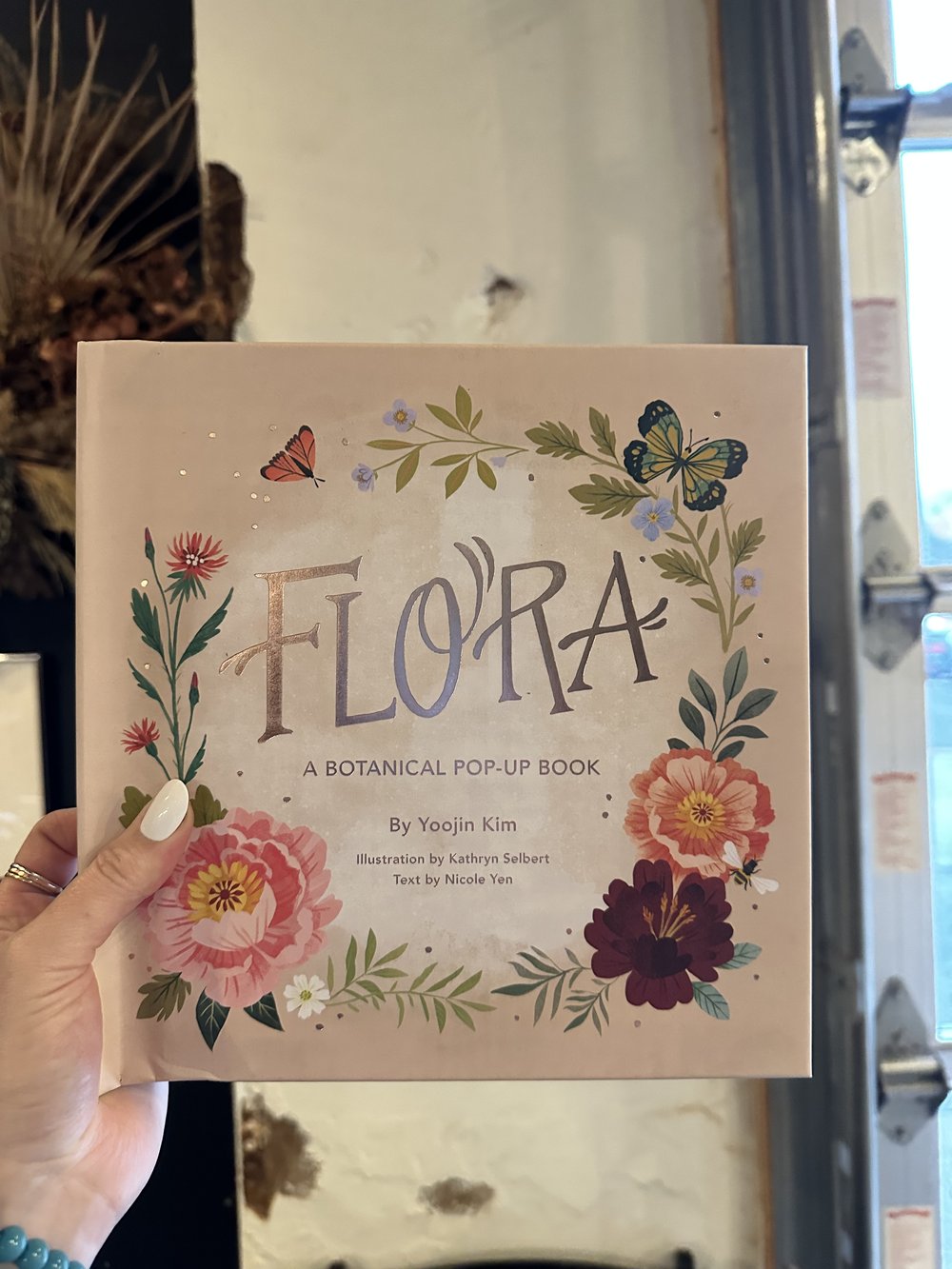flora: a botanical pop-up book book from flower + furbish Shop now at flower + furbish