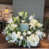 ivory and green urn arrangement
