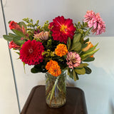 designer’s choice seasonal arrangement